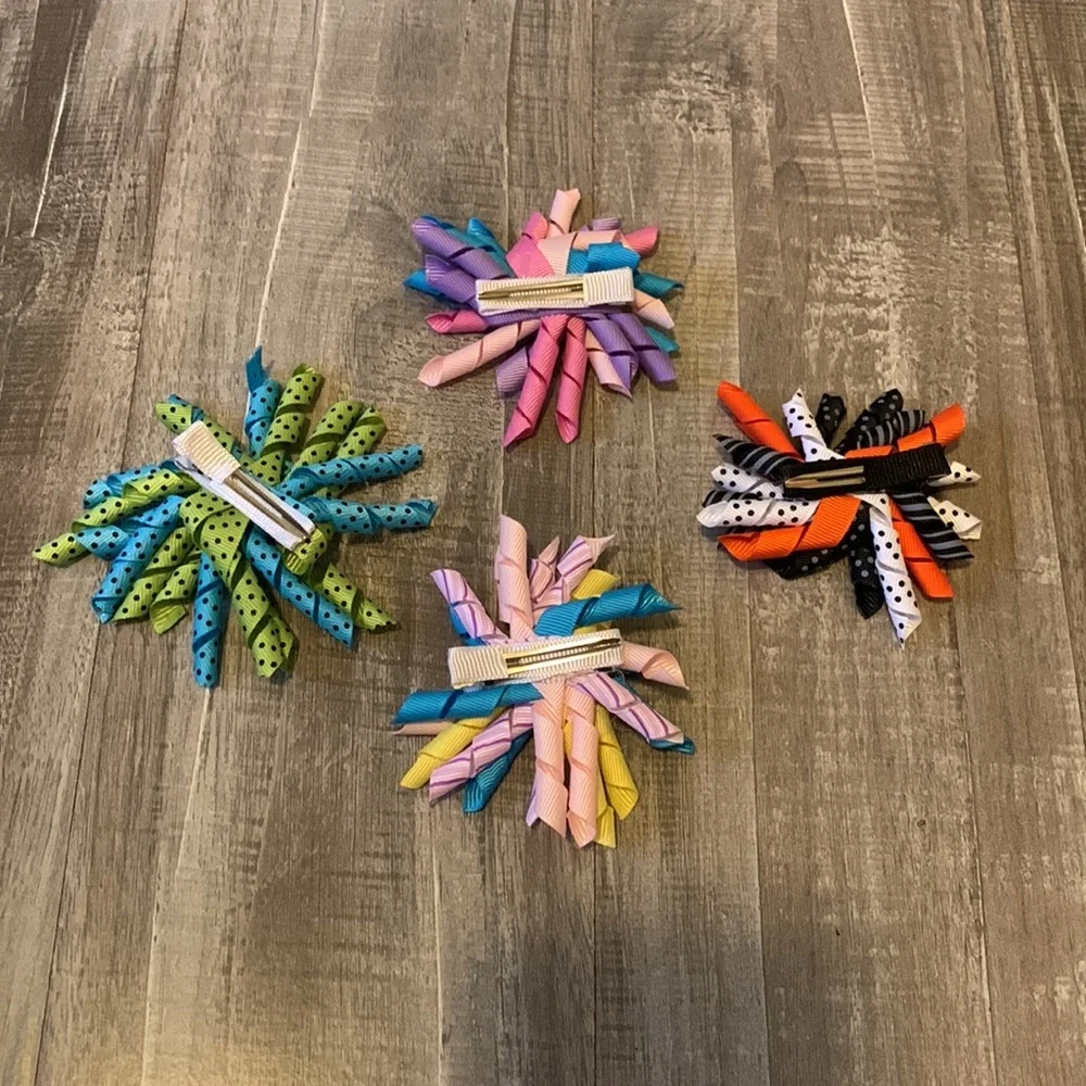 Lot of 4 Korkers hair‎ accessories.